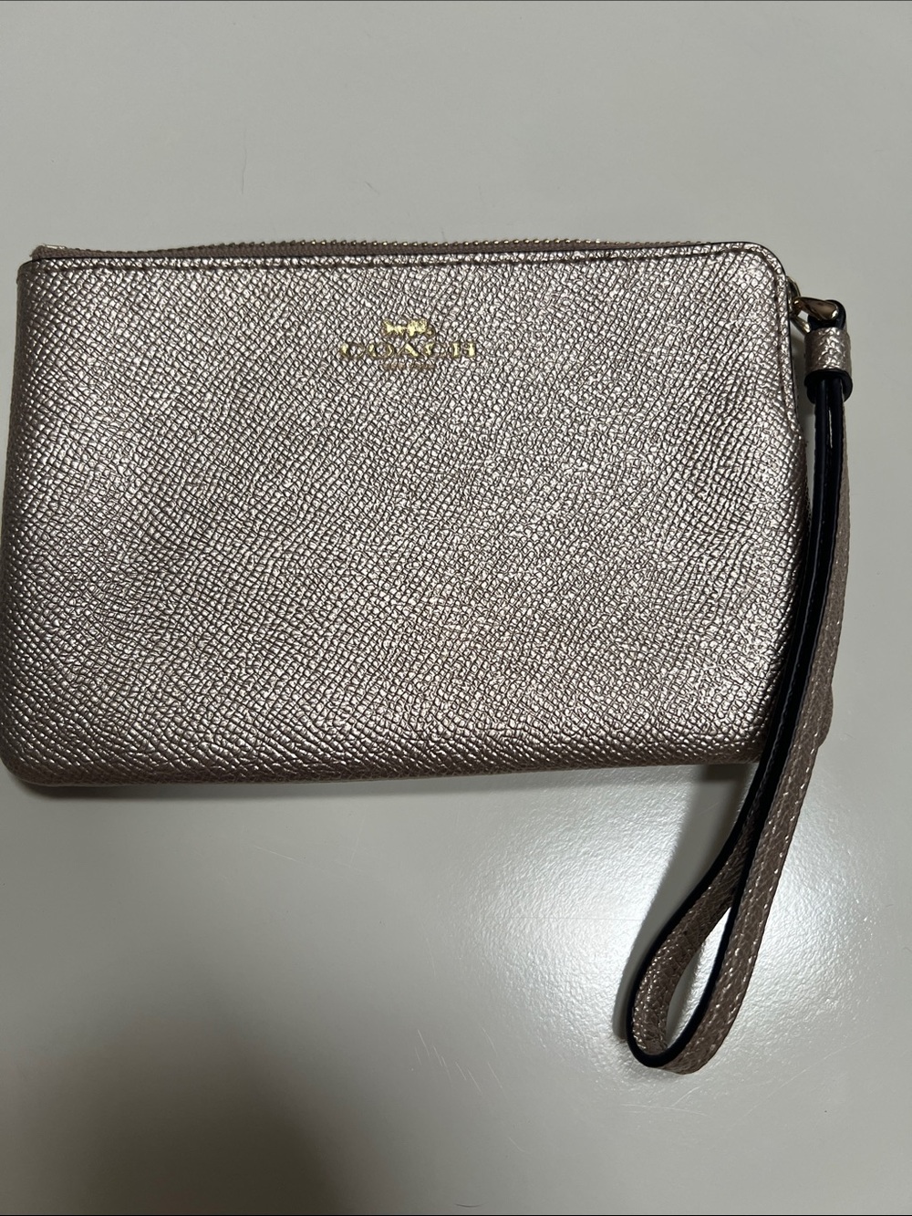 Coach Metallic Pebbled Leather Wristlet in Rose Gold-Taupe